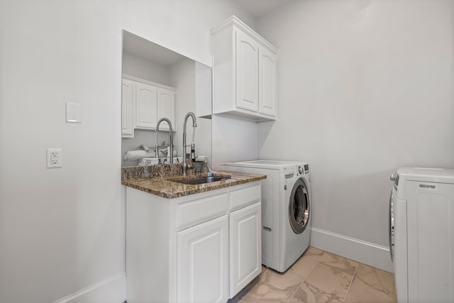 1190 Emerald Sound Blvd, Oak Point, TX 75068 - washroom with washer and clothes dryer, light marble finish floors, baseboards, and cabinet space