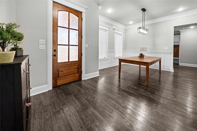 12908 County Road 463, Tyler, TX 75706 - foyer with dark wood-style flooring, ornamental molding, a decorative wall, recessed lighting, and wainscoting