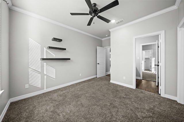 12908 County Road 463, Tyler, TX 75706 - unfurnished bedroom with baseboards, ornamental molding, carpet flooring, visible vents, and ceiling fan