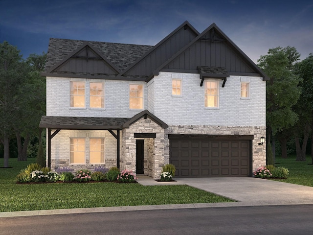 view of front of house featuring a garage, concrete driveway, board and batten siding, a front yard, and brick siding