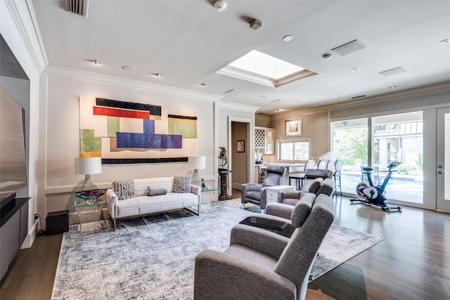 10989 Crooked Creek Dr, Dallas, TX 75229 - living area with ornamental molding, a skylight, and wood finished floors