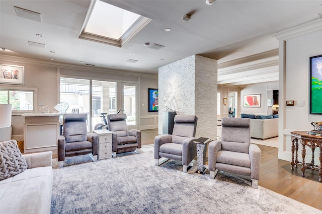 10989 Crooked Creek Dr, Dallas, TX 75229 - living area featuring ornamental molding, wood finished floors, a skylight, and recessed lighting