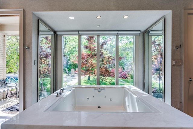 10989 Crooked Creek Dr, Dallas, TX 75229 - bathroom with a jetted tub and recessed lighting