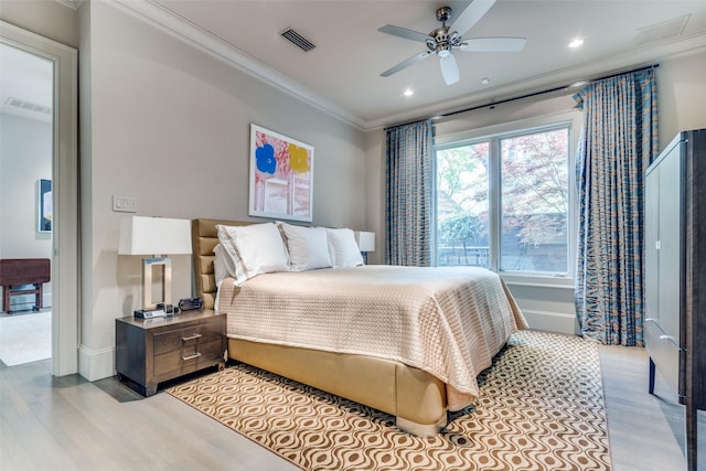 10989 Crooked Creek Dr, Dallas, TX 75229 - bedroom with light wood-type flooring, ornamental molding, recessed lighting, a ceiling fan, and baseboards