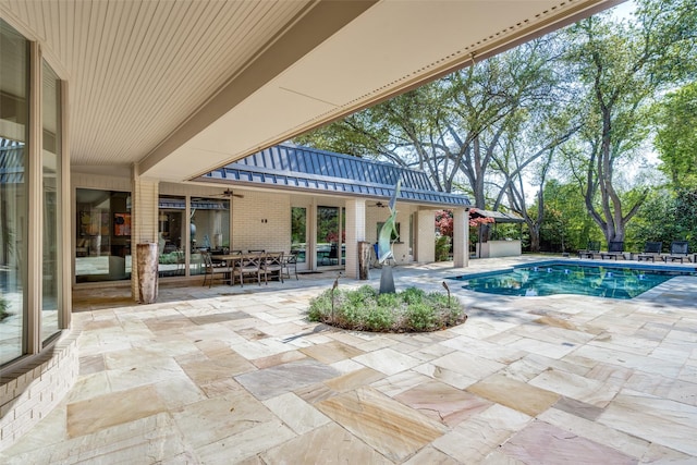 10989 Crooked Creek Dr, Dallas, TX 75229 - outdoor pool featuring a patio, outdoor dining space, and ceiling fan
