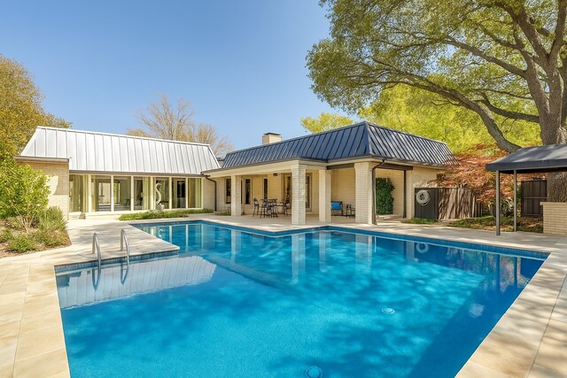 10989 Crooked Creek Dr, Dallas, TX 75229 - view of swimming pool featuring a patio and fence
