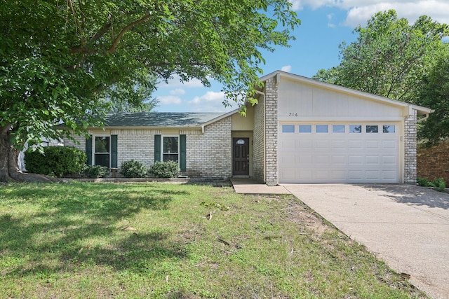 716 Meadow Mead Dr, Allen, TX 75002 - view of front facade featuring a garage, brick siding, driveway, and a front lawn