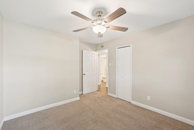 716 Meadow Mead Dr, Allen, TX 75002 - unfurnished bedroom featuring carpet floors, baseboards, a closet, and a ceiling fan