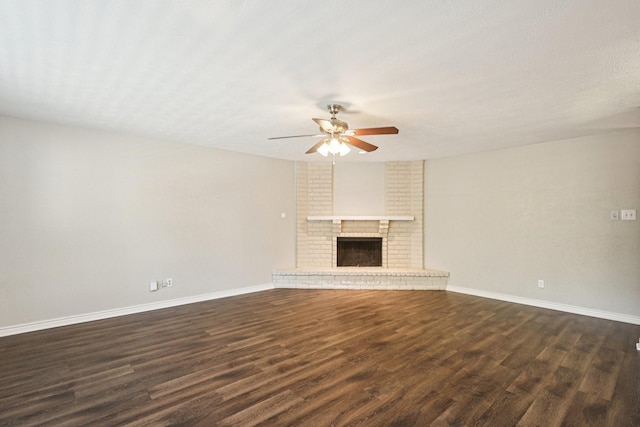 716 Meadow Mead Dr, Allen, TX 75002 - unfurnished living room with ceiling fan, dark wood-style floors, baseboards, and a brick fireplace