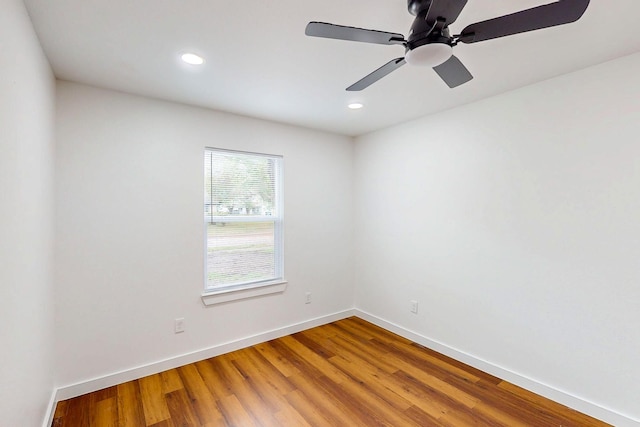 6840 Hillmont Dr, Dallas, TX 75217 - empty room featuring wood finished floors, ceiling fan, baseboards, and recessed lighting