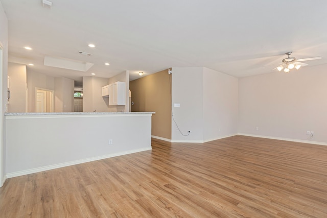 5013 Royal Burgess Dr, Fort Worth, TX 76135 - unfurnished living room with ceiling fan, light wood-style flooring, baseboards, visible vents, and recessed lighting