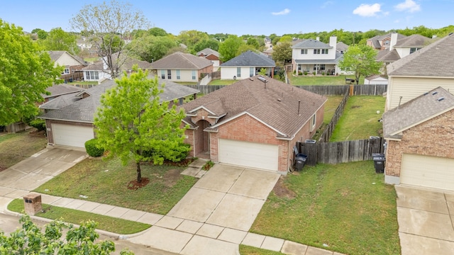5013 Royal Burgess Dr, Fort Worth, TX 76135 - view of front of home featuring brick siding, fence, a residential view, and a shingled roof