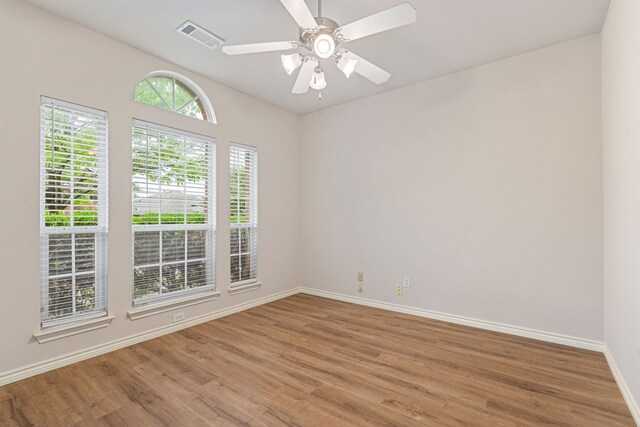 5013 Royal Burgess Dr, Fort Worth, TX 76135 - spare room featuring light wood-type flooring, visible vents, baseboards, and ceiling fan