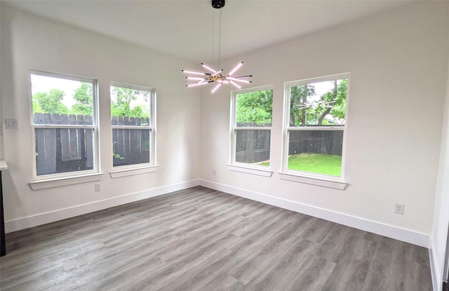 5629 Lester Granger, Fort Worth, TX 76112 - spare room with wood finished floors and baseboards