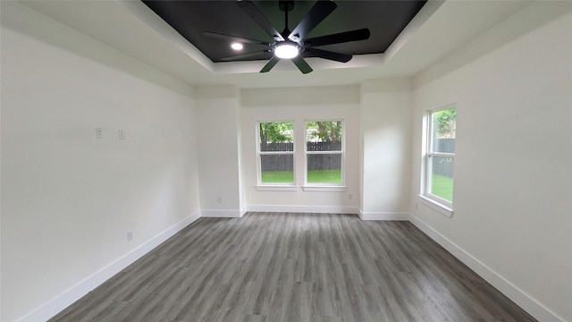 5629 Lester Granger, Fort Worth, TX 76112 - spare room with a raised ceiling, wood finished floors, baseboards, and ceiling fan