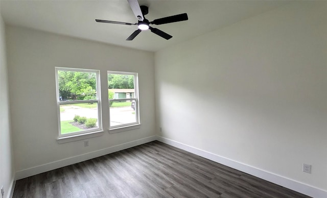 5629 Lester Granger, Fort Worth, TX 76112 - empty room featuring dark wood-type flooring, baseboards, and a ceiling fan