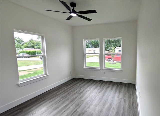 5629 Lester Granger, Fort Worth, TX 76112 - spare room with wood finished floors, baseboards, and a ceiling fan