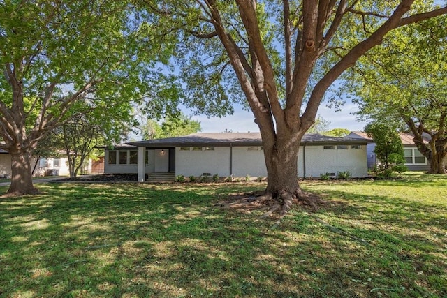 exterior space featuring a yard