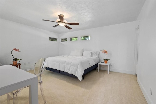 3848 S Drive, Fort Worth, TX 76109 - bedroom featuring light carpet, ceiling fan, and baseboards