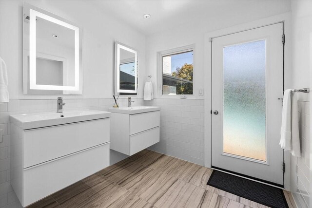3848 S Drive, Fort Worth, TX 76109 - full bath featuring two vanities and tile walls