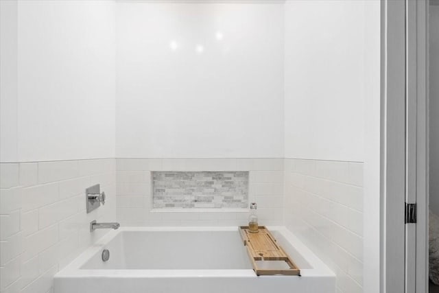 full bath with a garden tub