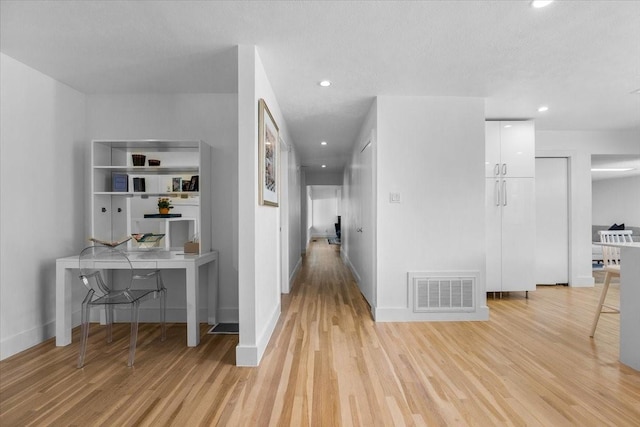 3848 S Drive, Fort Worth, TX 76109 - hallway featuring light wood-type flooring, baseboards, a desk, and recessed lighting