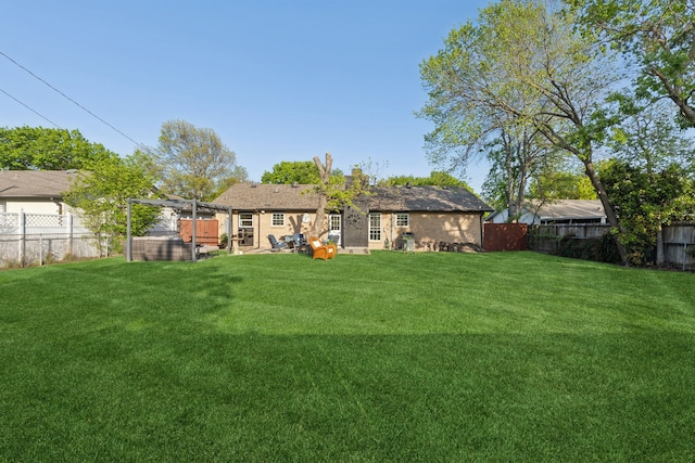 view of yard featuring a fenced backyard and a patio area