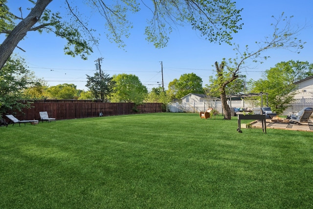 view of yard featuring a fenced backyard