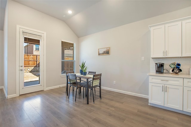 3908 Rochelle St, Celina, TX 75009 - dining space featuring lofted ceiling, wood finished floors, and recessed lighting