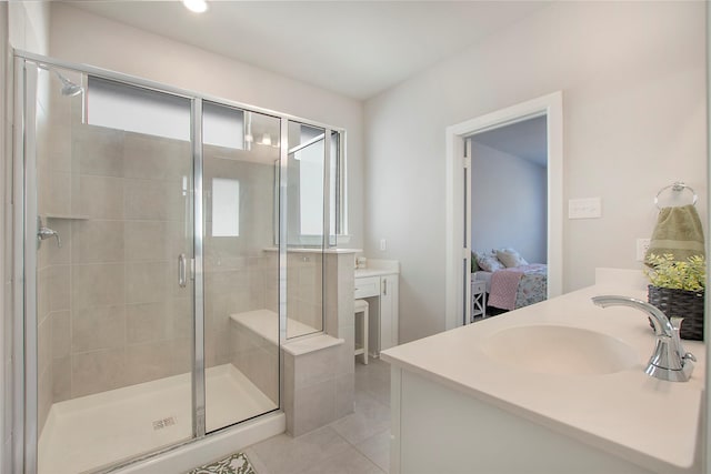 3908 Rochelle St, Celina, TX 75009 - bathroom featuring vanity, plenty of natural light, a stall shower, tile patterned floors, and recessed lighting