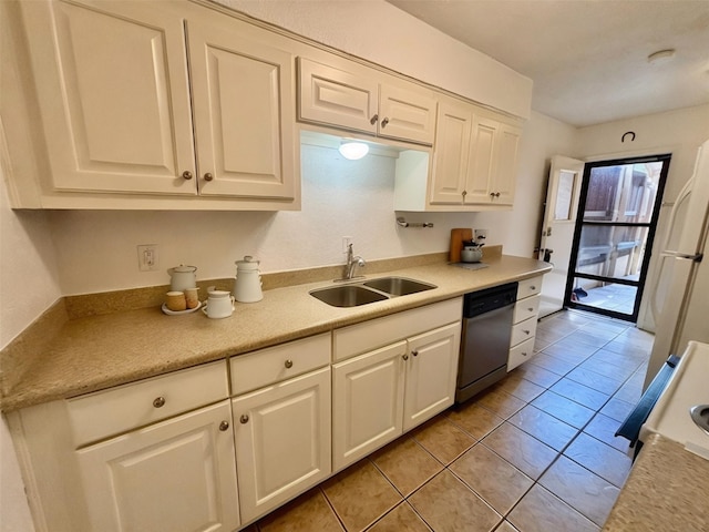 13633 Weald Green St, Dallas, TX 75240 - kitchen with stainless steel dishwasher, a sink, white cabinetry, and light countertops