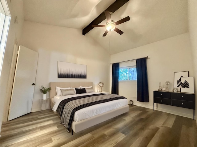 13633 Weald Green St, Dallas, TX 75240 - bedroom with beamed ceiling, wood finished floors, high vaulted ceiling, and a ceiling fan