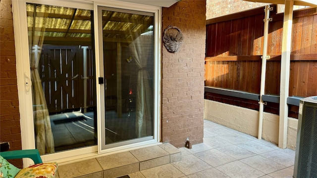 13633 Weald Green St, Dallas, TX 75240 - property entrance featuring brick siding and central AC