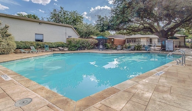 13633 Weald Green St, Dallas, TX 75240 - community pool with a patio