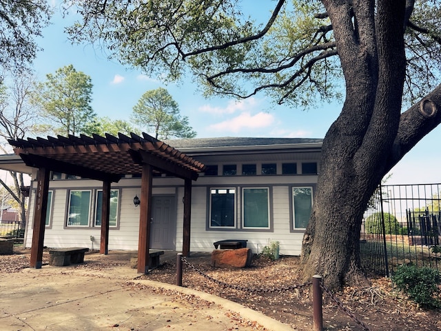 13633 Weald Green St, Dallas, TX 75240 - view of front facade with a pergola