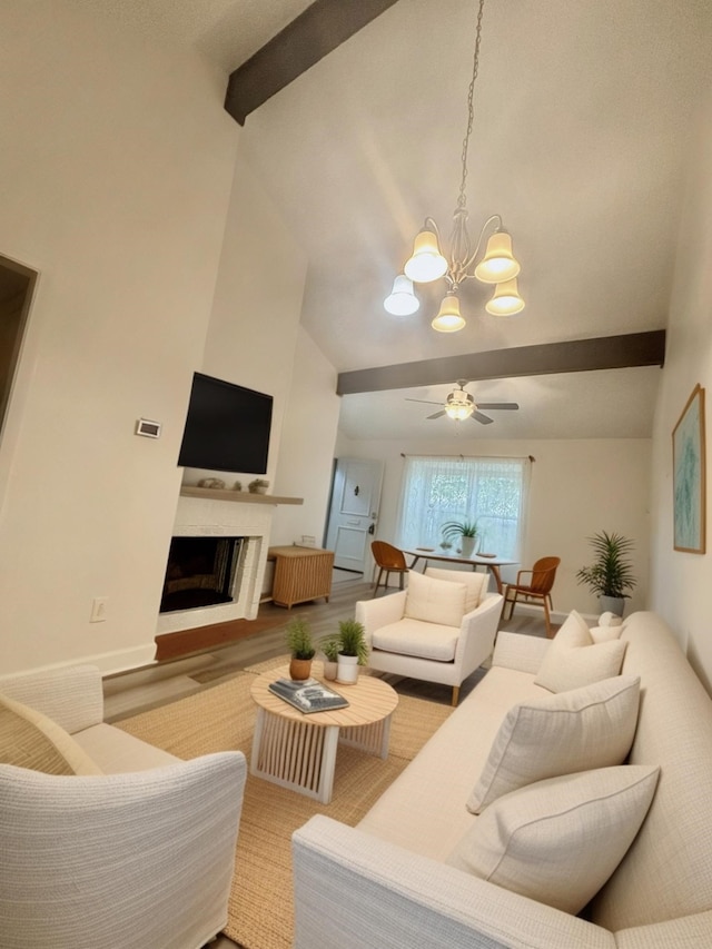 13633 Weald Green St, Dallas, TX 75240 - living area featuring a chandelier, a fireplace, ceiling fan, and wood finished floors