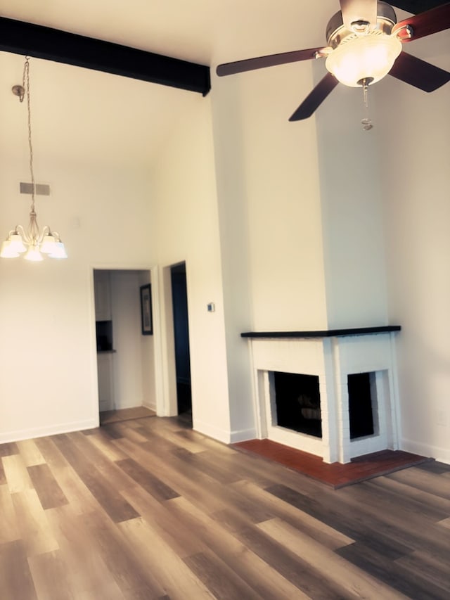 13633 Weald Green St, Dallas, TX 75240 - unfurnished living room featuring a fireplace, high vaulted ceiling, wood finished floors, beam ceiling, and baseboards