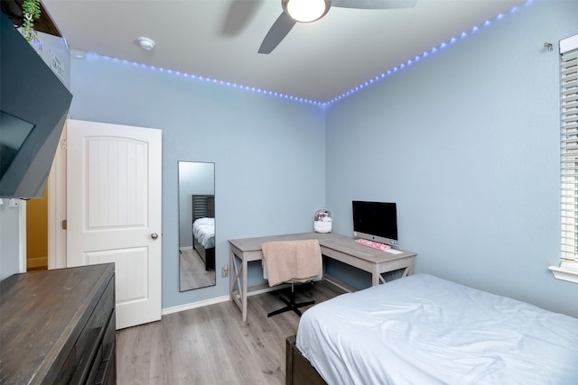1664 Laramie Ln, Burleson, TX 76028 - bedroom with ceiling fan and wood finished floors