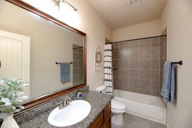 1664 Laramie Ln, Burleson, TX 76028 - bathroom with visible vents, shower / tub combo, toilet, vanity, and tile patterned flooring