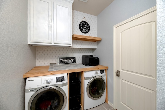 1664 Laramie Ln, Burleson, TX 76028 - clothes washing area featuring separate washer and dryer and cabinet space