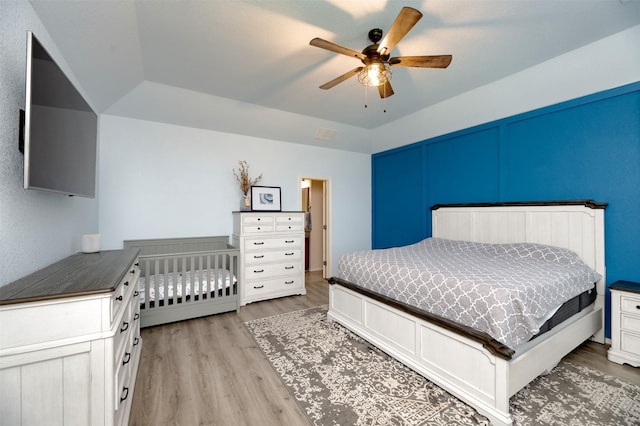 1664 Laramie Ln, Burleson, TX 76028 - bedroom with light wood-type flooring and a ceiling fan