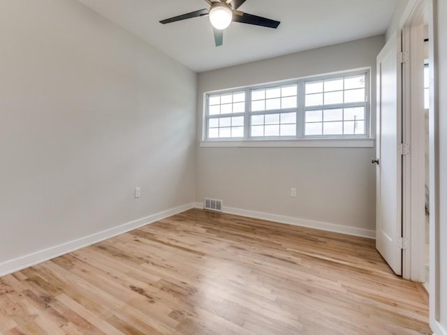 3124 Merrell Rd, Dallas, TX 75229 - unfurnished room featuring a ceiling fan, light wood-type flooring, and baseboards