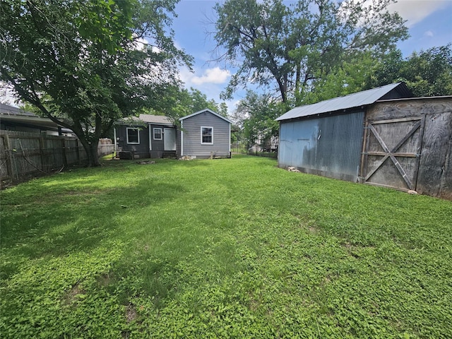 506 E Bowie St, Mexia, TX 76667 - view of yard with an outdoor structure