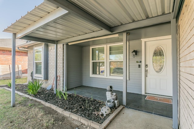 7820 Prairie Dr, Watauga, TX 76148 - entrance to property with brick siding and a porch