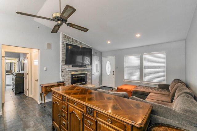 7820 Prairie Dr, Watauga, TX 76148 - living area with vaulted ceiling, ceiling fan, a fireplace, recessed lighting, and baseboards