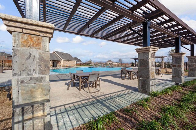 11328 Cider St, Fort Worth, TX 76052 - view of patio / terrace with a community pool and a pergola