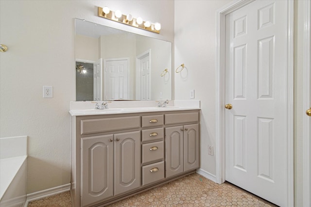 12072 Half Hitch Trl, Frisco, TX 75035 - full bathroom with double vanity, a sink, and baseboards