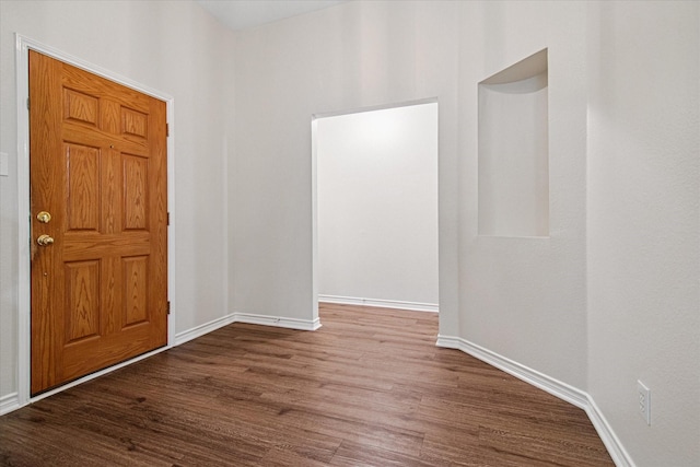 12072 Half Hitch Trl, Frisco, TX 75035 - spare room featuring baseboards and dark wood finished floors