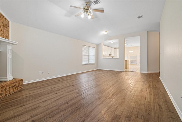 12072 Half Hitch Trl, Frisco, TX 75035 - unfurnished living room with visible vents, baseboards, a ceiling fan, and wood finished floors