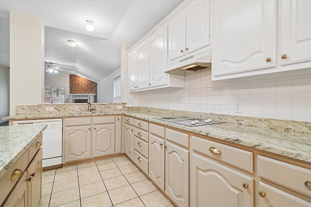 12072 Half Hitch Trl, Frisco, TX 75035 - kitchen with light tile patterned floors, white appliances, under cabinet range hood, a sink, and lofted ceiling